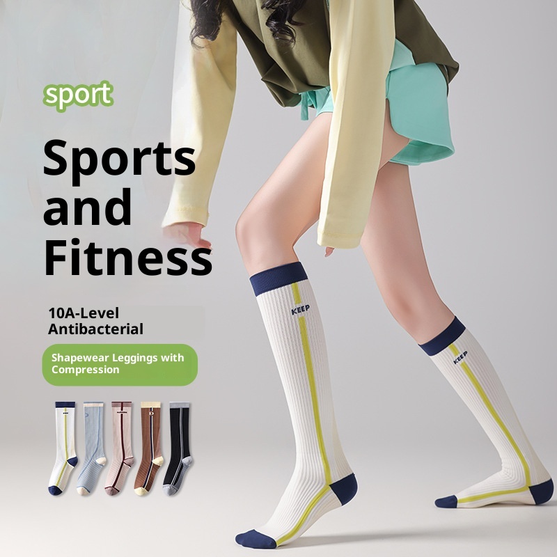 Chaussettes de sport Yoga Micro pour femmes, idéales pour le fitness et le cyclisme, avec maintien vertical du mollet et design rayé amincissant._voghion.com