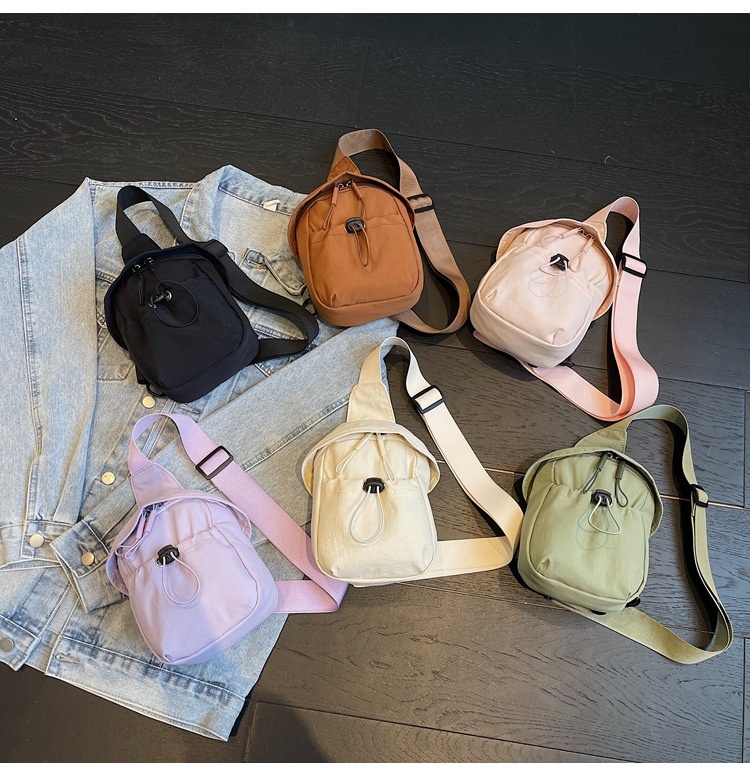 001 2025 Neue trendige modische Ruiying Damen kleine Outdoor-Schultertasche in Unifarben, wasserdicht_voghion.com