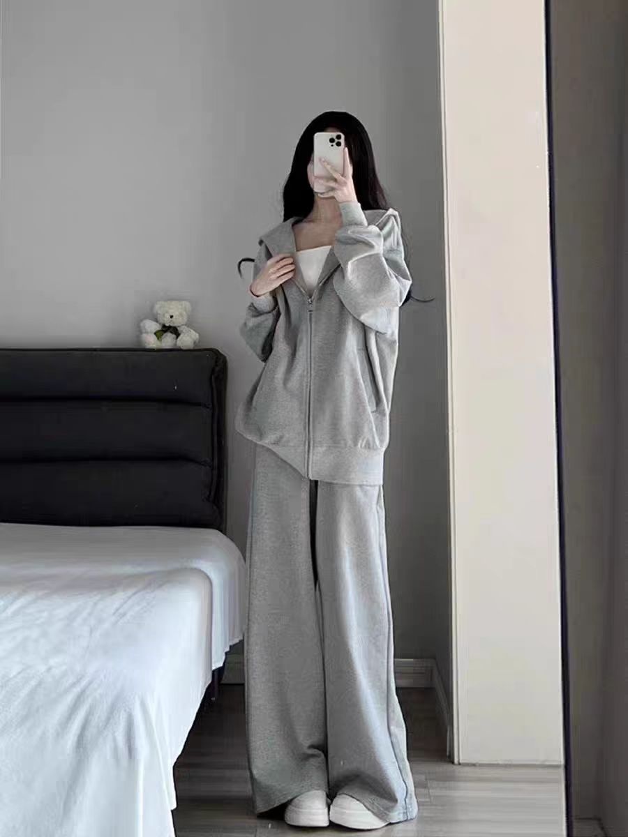 001 2025 Nieuwe herfst-winter losse grijze sweatshirt met capuchon en wijde broek, tweedelige set voor dames_voghion.com