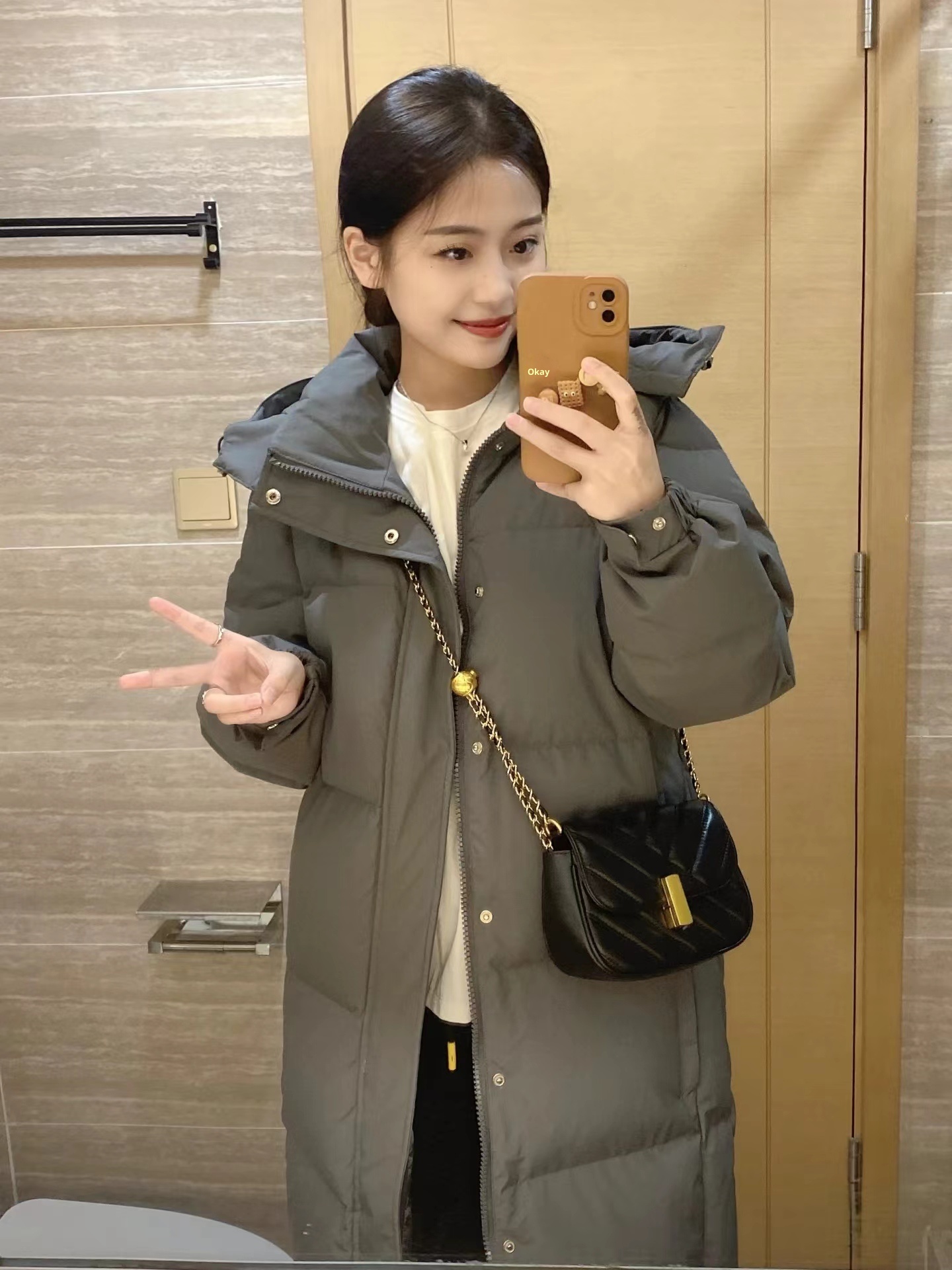 Doudoune ChicShe Zhongxi noire pour femme, extra longue, au-dessus du genou, épaisse, coupe ample, capuche amovible, nouveau modèle 2024._voghion.com