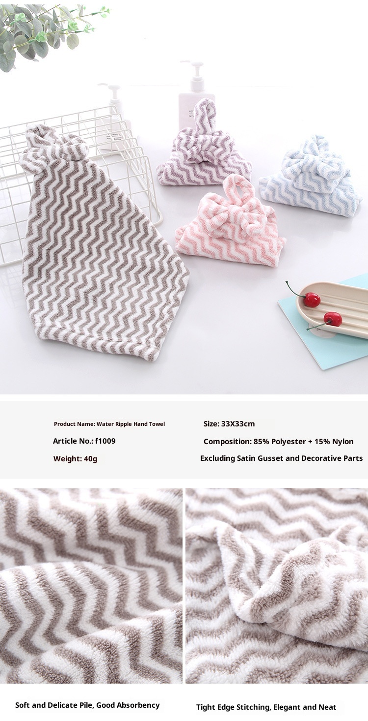 Il produttore Lillian vende asciugamani da appendere in pile di corallo con fiocco per cucina e bagno, morbidi e assorbenti._voghion.com