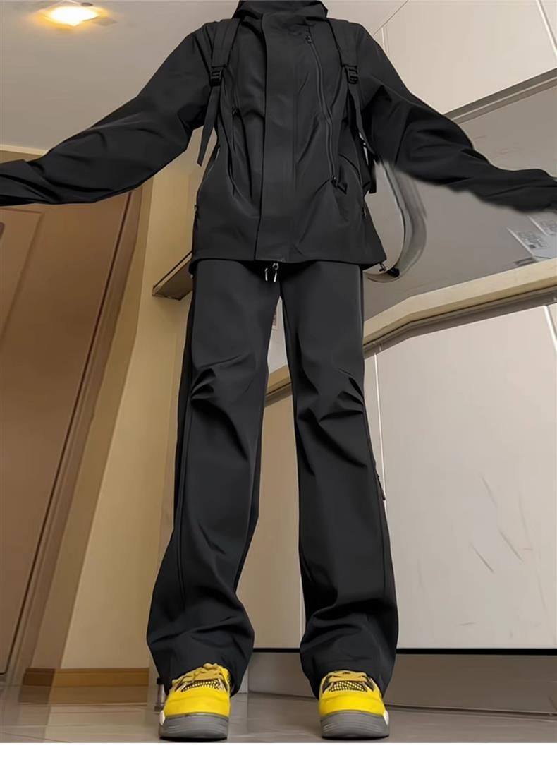 Pantalon softshell imperméable et décontracté pour homme, couleur unie, style américain, idéal pour le printemps et l'automne, avec une touche fonctionnelle et un esprit randonnée._voghion.com