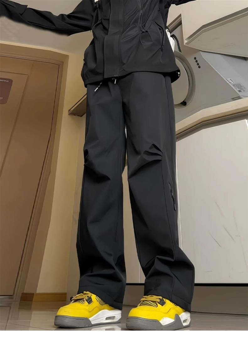 Pantalon softshell imperméable et décontracté pour homme, couleur unie, style américain, idéal pour le printemps et l'automne, avec une touche fonctionnelle et un esprit randonnée._voghion.com