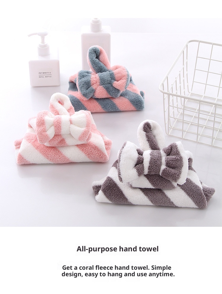 Il produttore Lillian vende asciugamani da appendere in pile di corallo con fiocco per cucina e bagno, morbidi e assorbenti._voghion.com