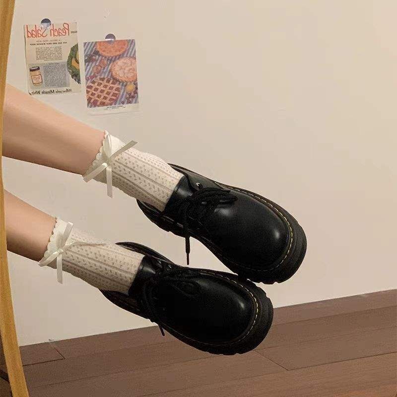 Mocassins Mary Jane noirs en cuir souple à semelle épaisse, style britannique, collection automne-hiver 2025._voghion.com