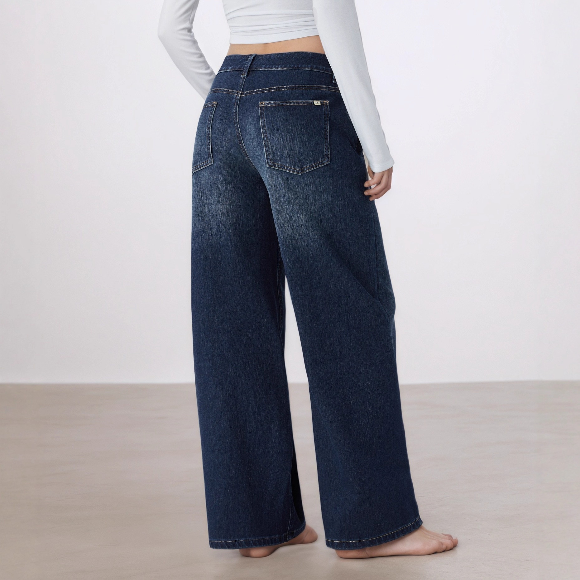 ELLE 2025 European And American Cross-Border Irregular Asymmetric Low Waist Diagonal Button Jeans For Women TK Hot Item_mkmklike.com