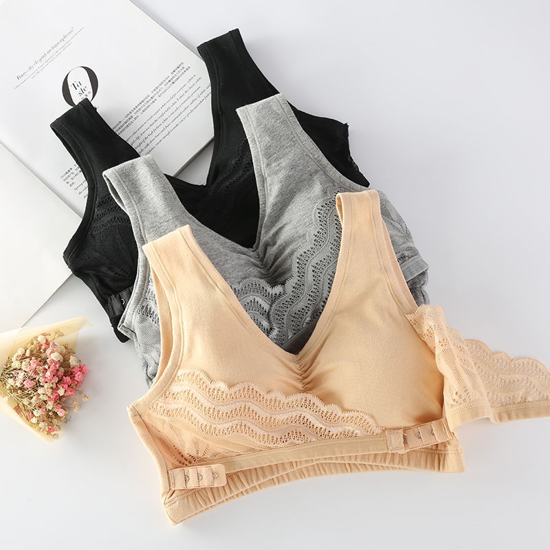 Top esportivo feminino de alta qualidade, em algodão puro, com botões frontais, sem aro e com detalhes em renda. Cor sólida. Modelo com bojo completo. Disponível para atacado._voghion.com