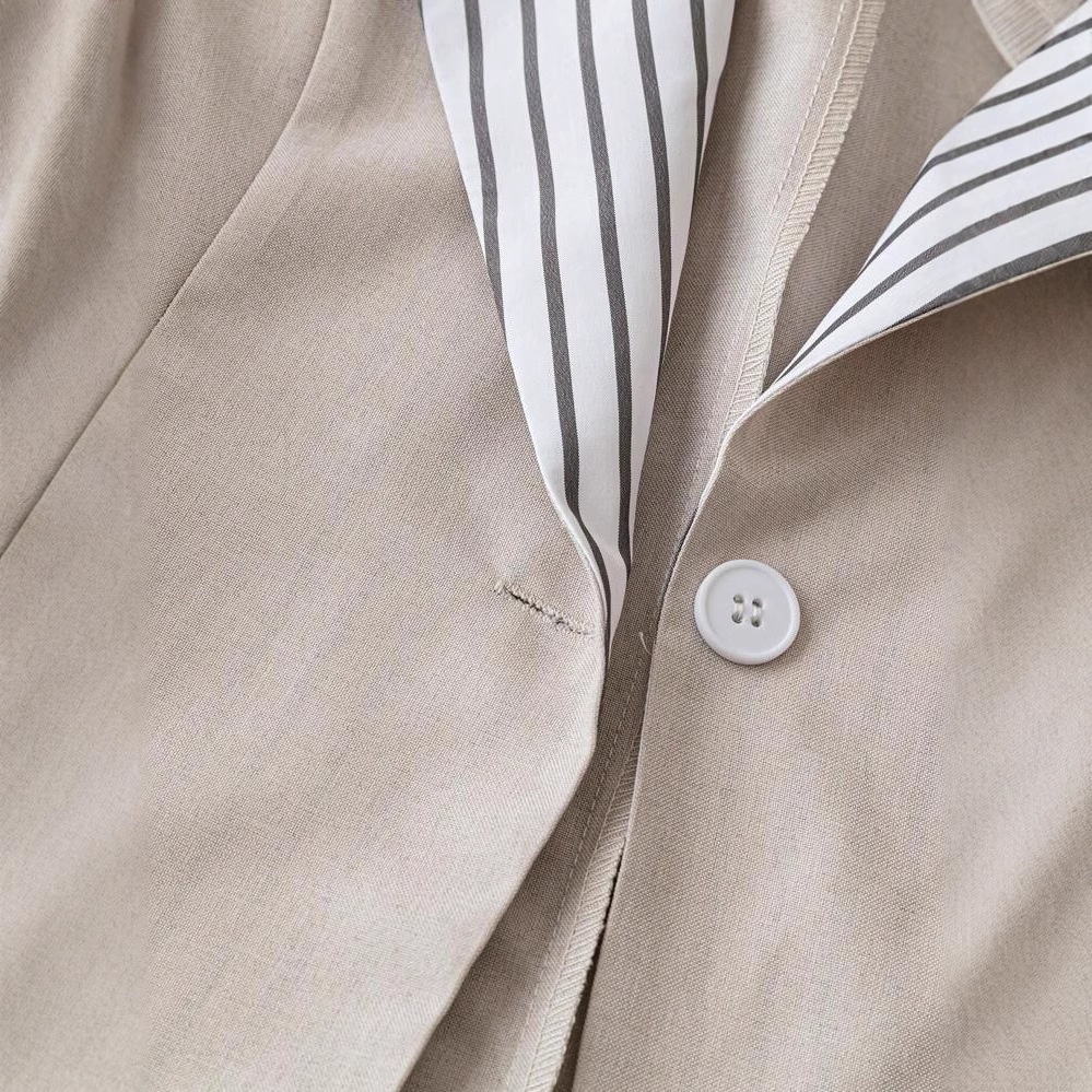 Blazer da donna in stile britannico, modello ampio e snellente, con revers a blocchi di colore, nuovo, stile transfrontaliero europeo e americano, 2025._voghion.com