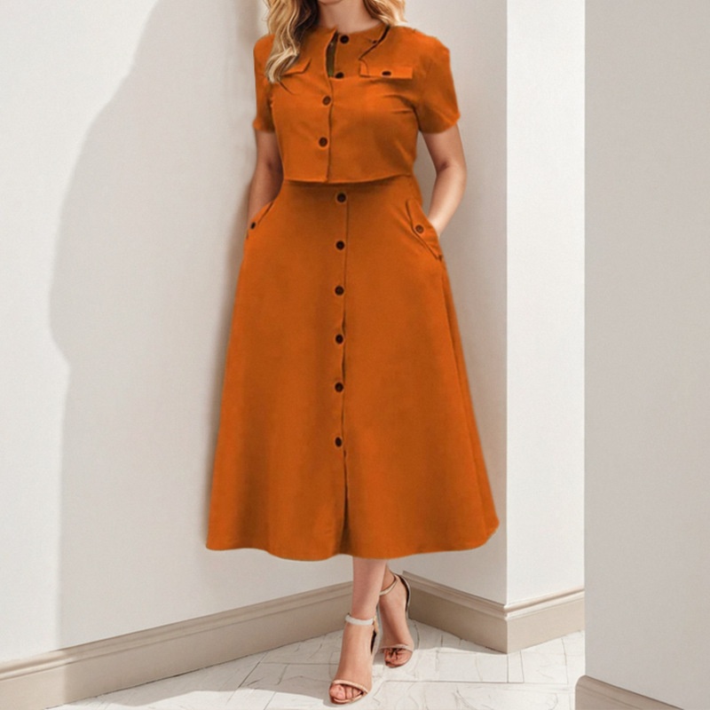 Conjunto elegante de mulher com top de cor sólida e saia chic_voghion.com