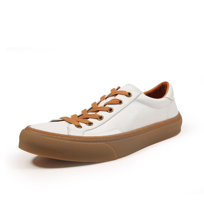 Baskets basses décontractées en cuir véritable blanc respirant, style européen, fabriquées à la main à Guangzhou. Chaussures de skate blanches, respirantes et confortables._voghion.com