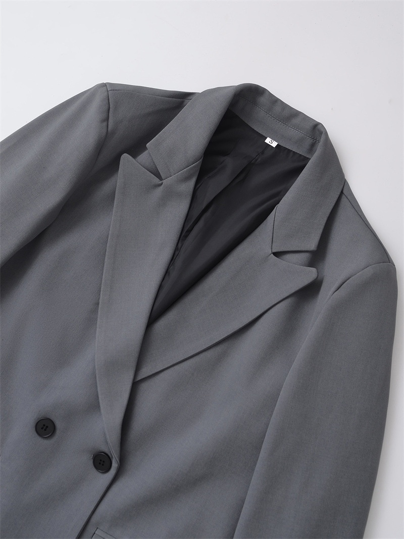 Modieuze losvallende damesblazer met dubbele rij knopen_voghion.com