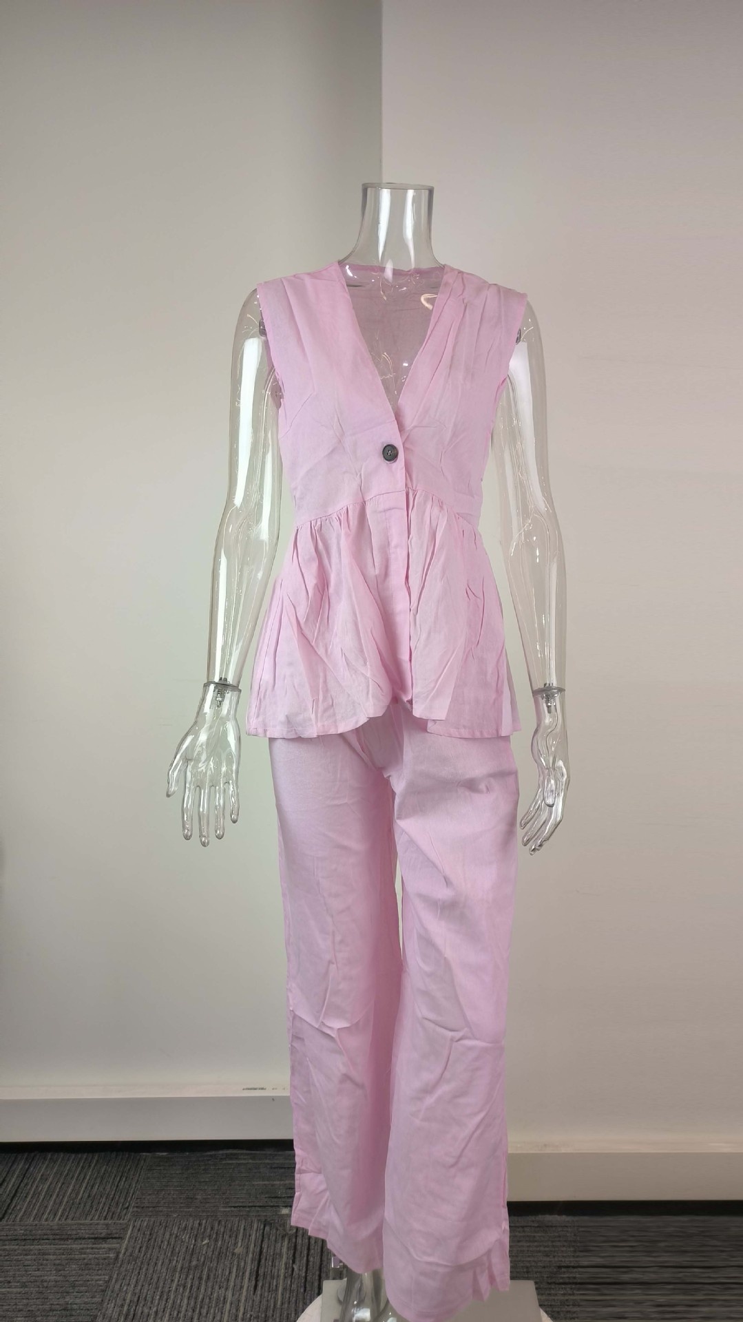 Conjunto de mujer top y pantalones elegante cuello en v sin manga_voghion.com