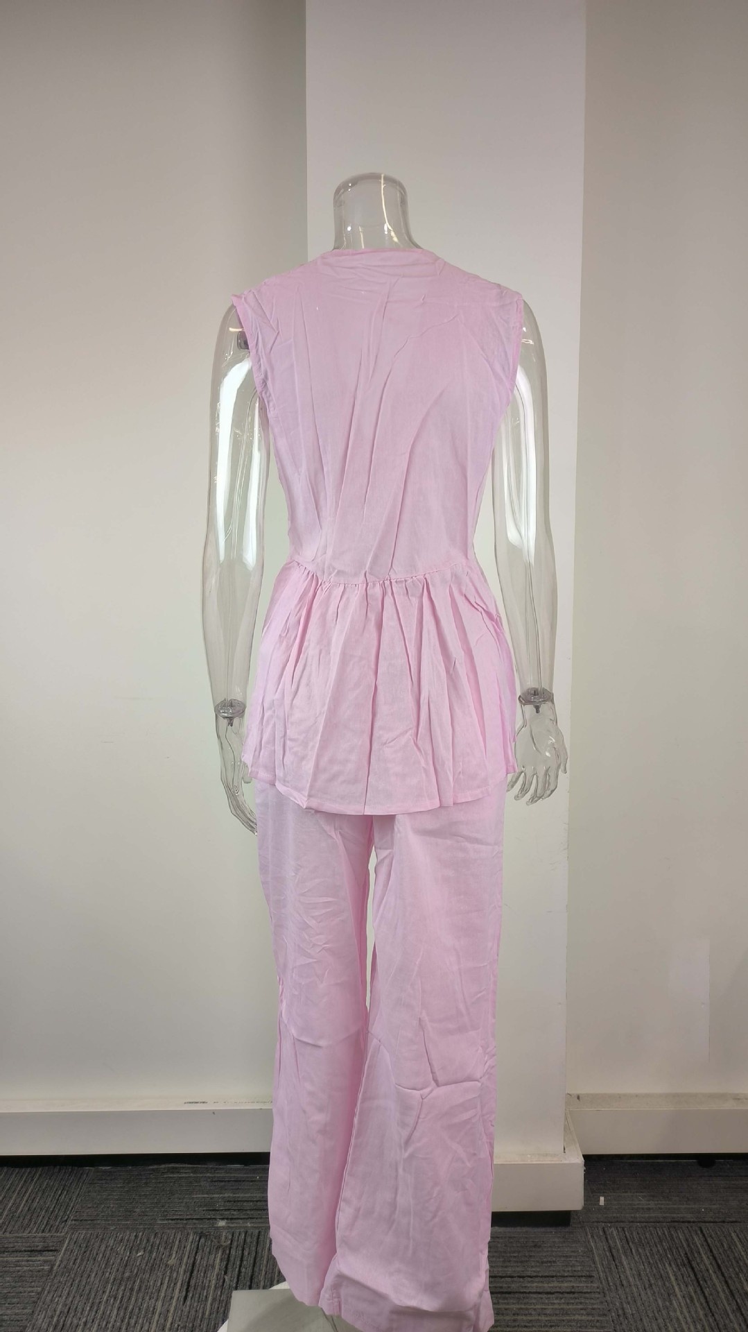 Conjunto de mujer top y pantalones elegante cuello en v sin manga_voghion.com