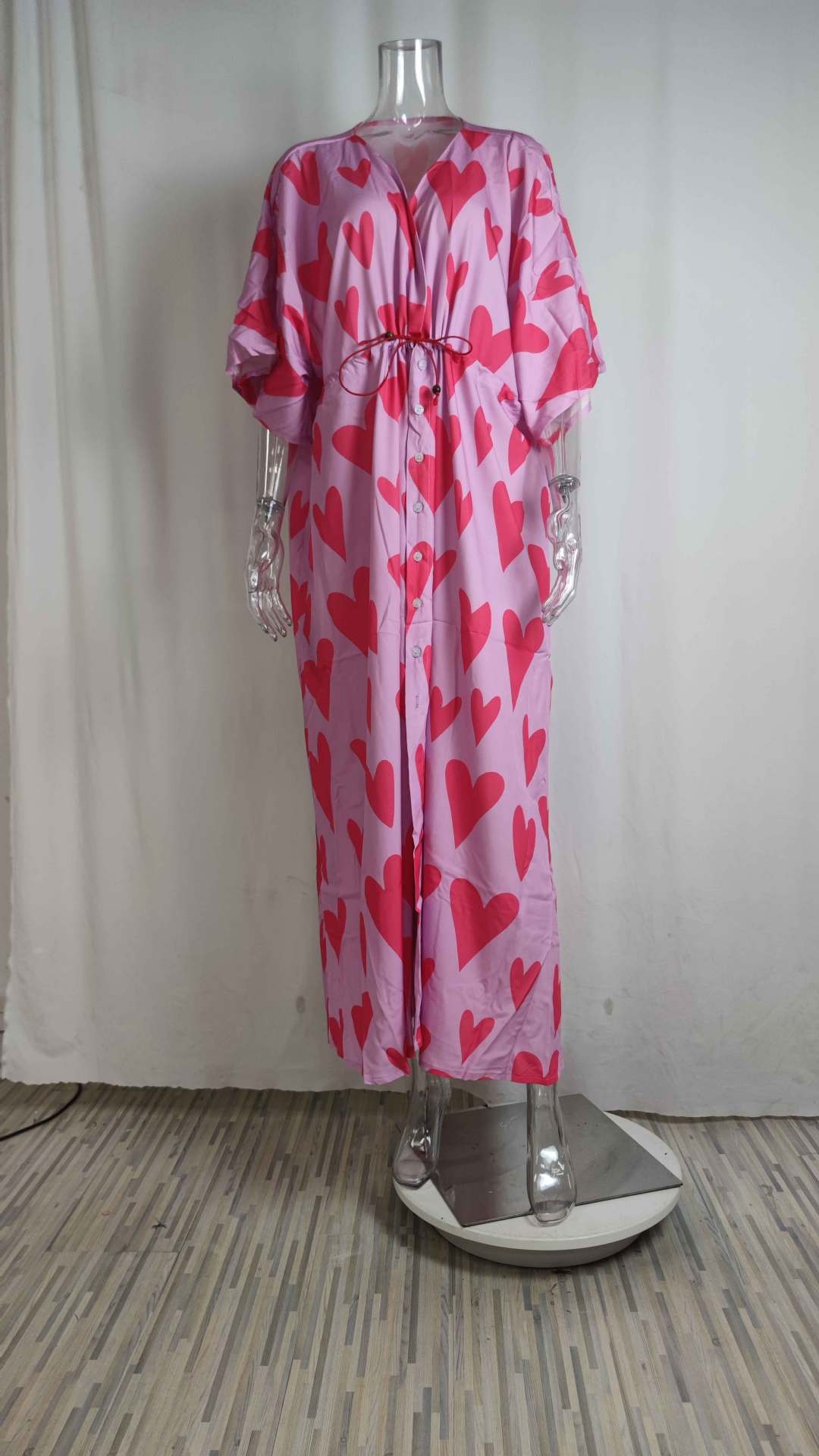 Dames maxi jurk met v-hals print en wijde zoom_voghion.com