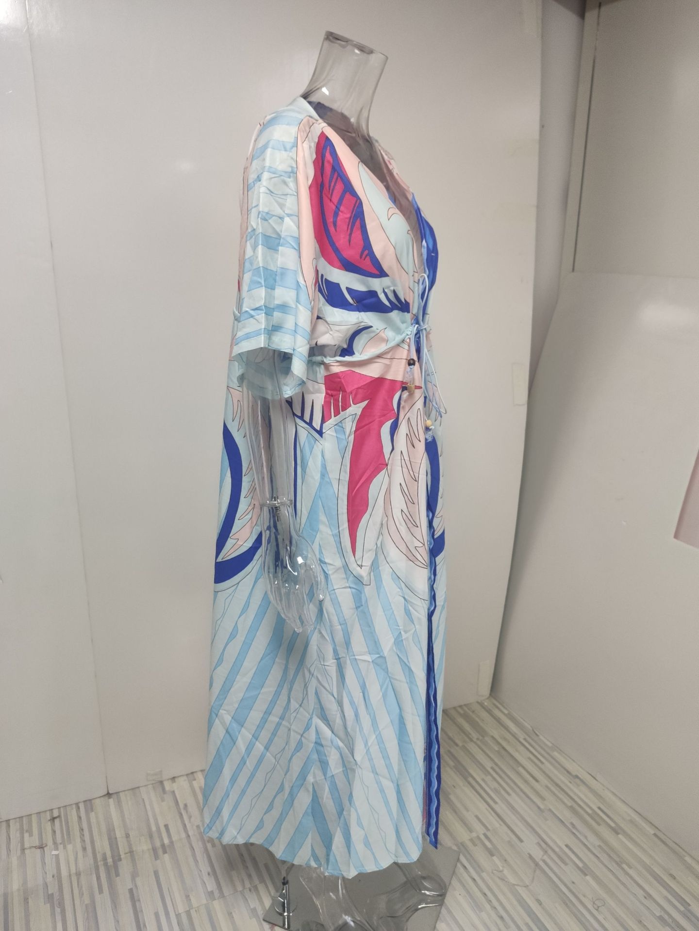 Dames maxi jurk met v-hals print en wijde zoom_voghion.com