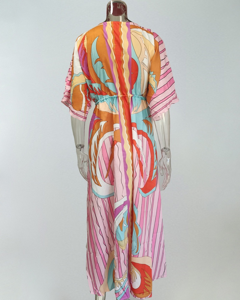 Dames maxi jurk met v-hals print en wijde zoom_voghion.com