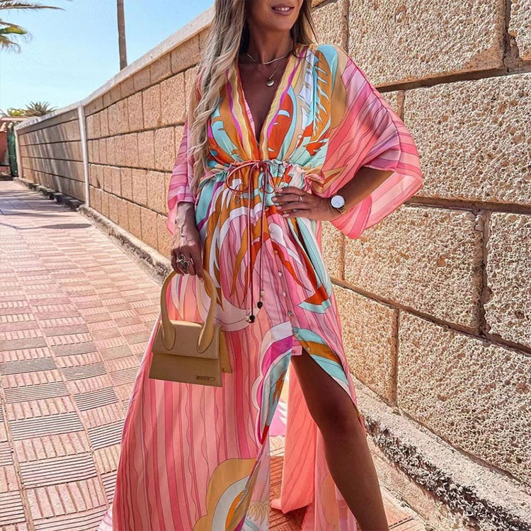 Dames maxi jurk met v-hals print en wijde zoom_voghion.com