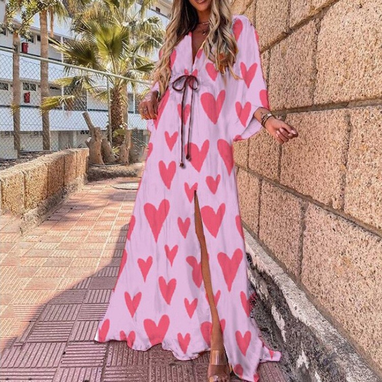 Dames maxi jurk met v-hals print en wijde zoom_voghion.com