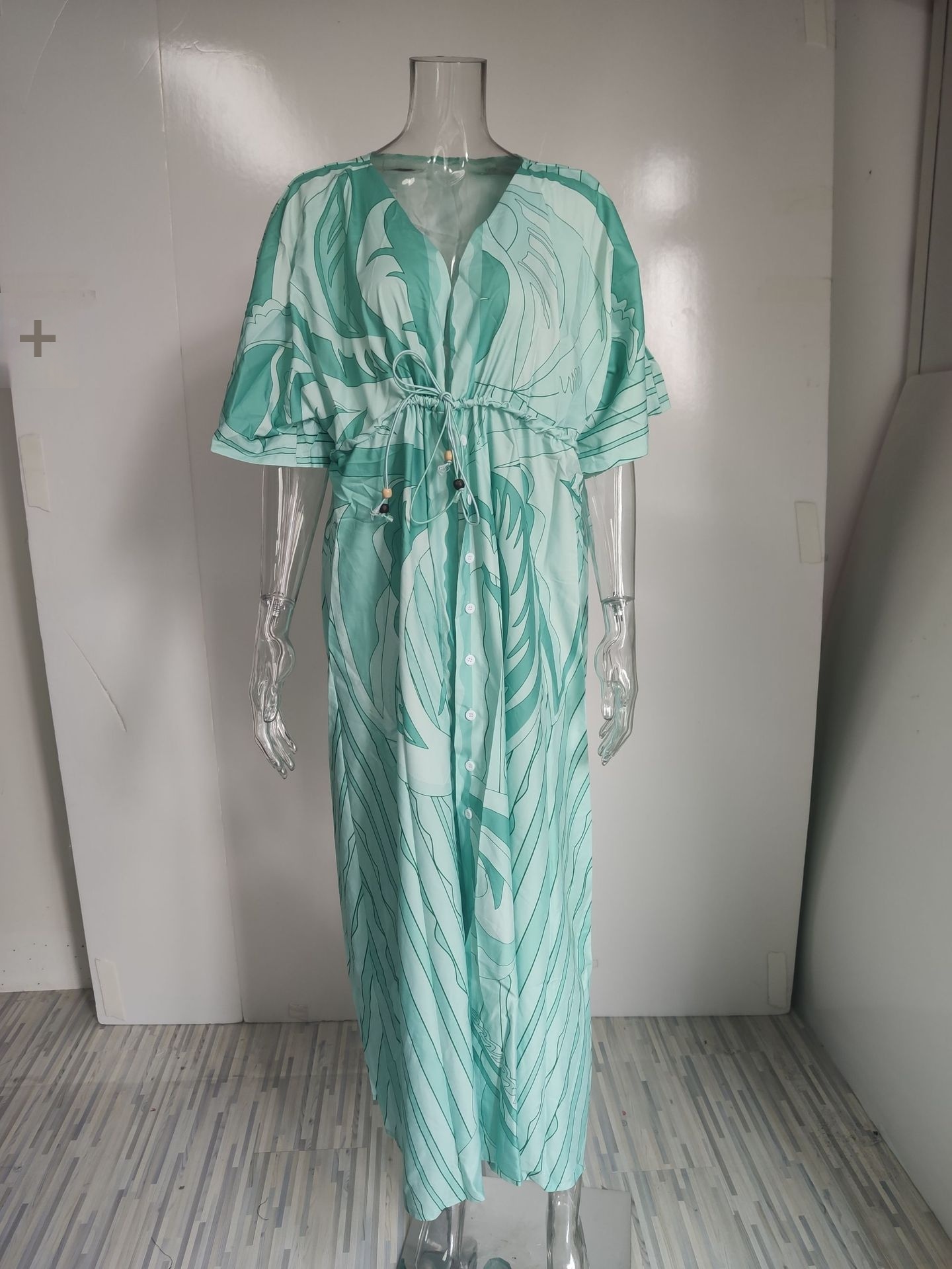 Dames maxi jurk met v-hals print en wijde zoom_voghion.com