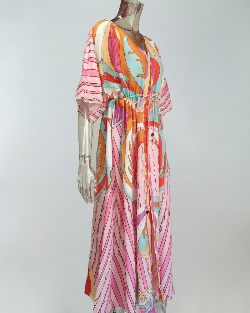 Dames maxi jurk met v-hals print en wijde zoom_voghion.com