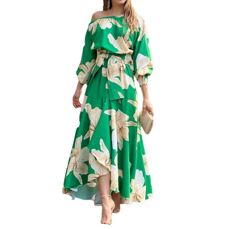 Coleção Primavera 2026 da Moda Feminina Europeia e Americana: Vestido elegante de manga comprida com estampa, decote assimétrico e tamanhos grandes._voghion.com