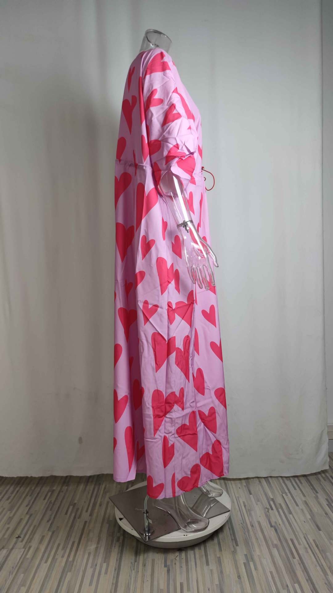 Dames maxi jurk met v-hals print en wijde zoom_voghion.com