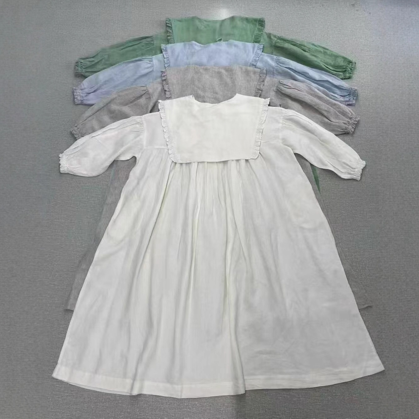 Langes, lockeres und vielseitiges Leinenkleid im Bohemian-Stil, elegant und einfarbig, neu für Herbst 2025_voghion.com