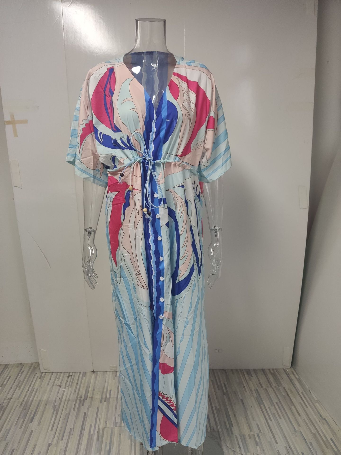 Dames maxi jurk met v-hals print en wijde zoom_voghion.com