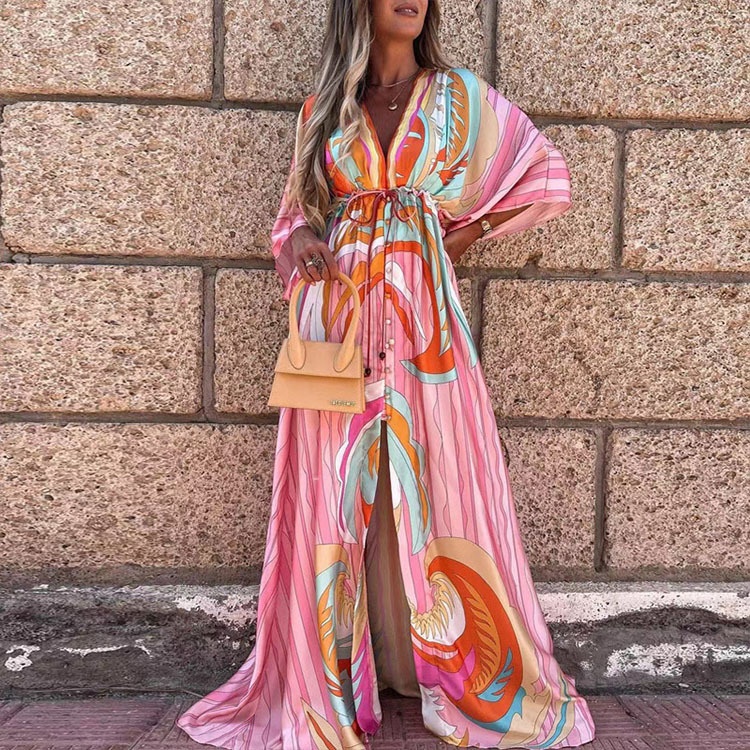 Dames maxi jurk met v-hals print en wijde zoom_voghion.com