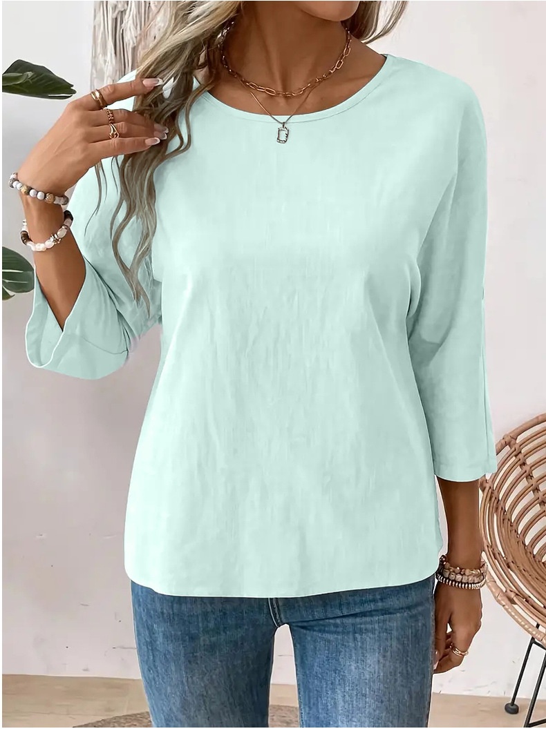 Chemise femme unie à col rond, design simple et tendance, élégante et polyvalente, à porter au quotidien._voghion.com