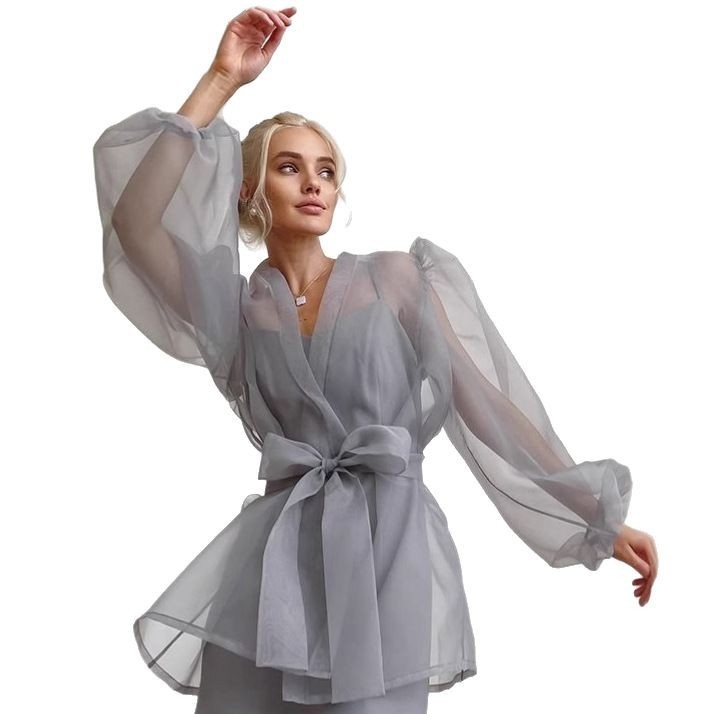 Camicetta ampia e trasparente da donna in stile euro-americano per la primavera/estate 2025, con maniche a sbuffo e inserti in pizzo a rete._voghion.com