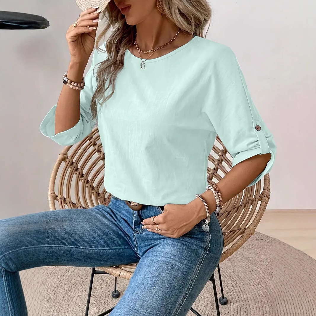Chemise femme unie à col rond, design simple et tendance, élégante et polyvalente, à porter au quotidien._voghion.com