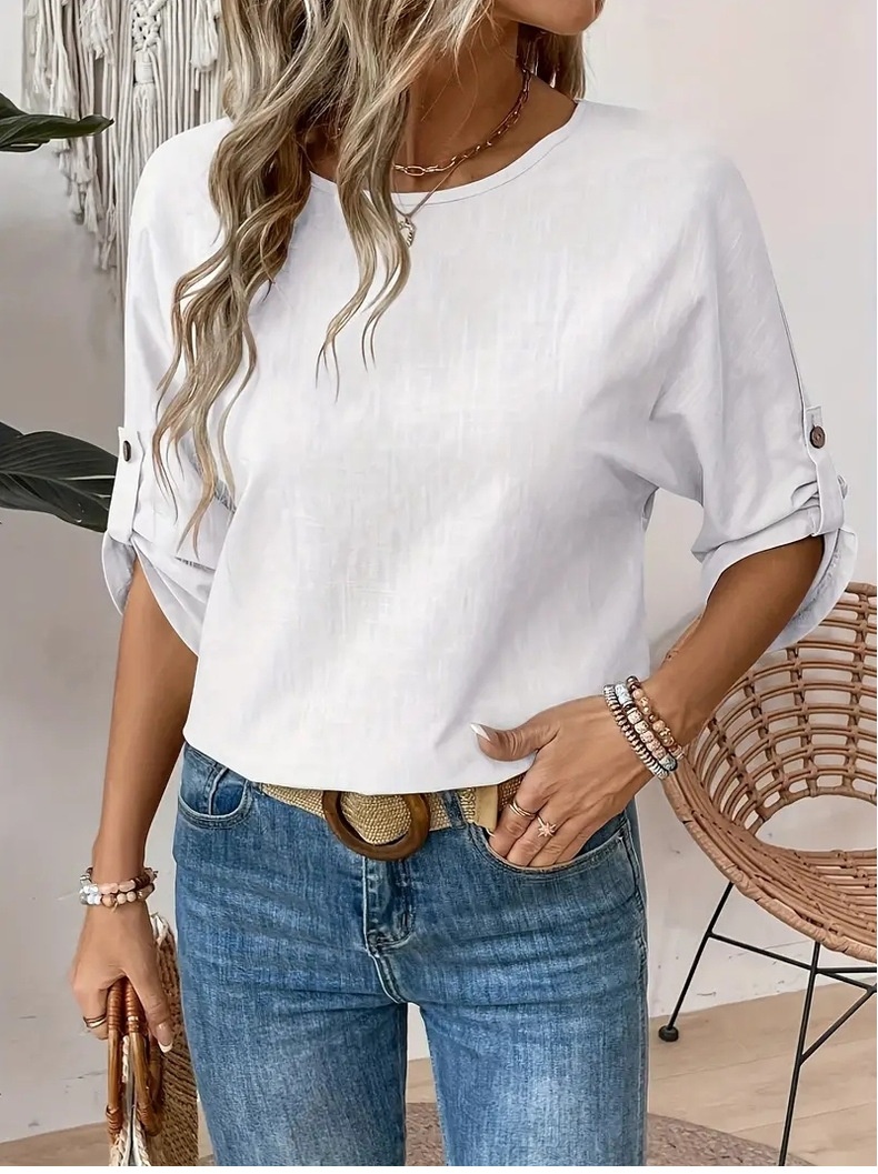 Chemise femme unie à col rond, design simple et tendance, élégante et polyvalente, à porter au quotidien._voghion.com