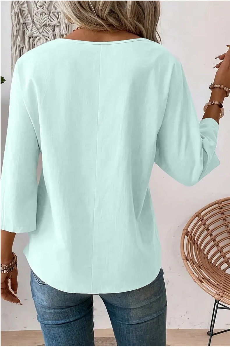 Chemise femme unie à col rond, design simple et tendance, élégante et polyvalente, à porter au quotidien._voghion.com