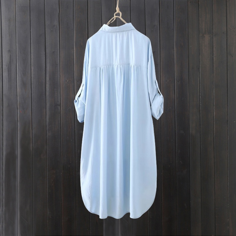 Camicia da donna bianca a tinta unita, media lunghezza, per esportazione transfrontaliera, estiva, casual, ampia, davanti corta, dietro lunga, ideale per il sole._voghion.com