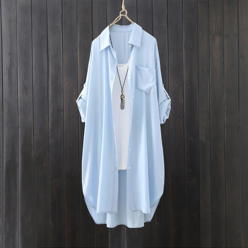 Camicia da donna bianca a tinta unita, media lunghezza, per esportazione transfrontaliera, estiva, casual, ampia, davanti corta, dietro lunga, ideale per il sole._voghion.com