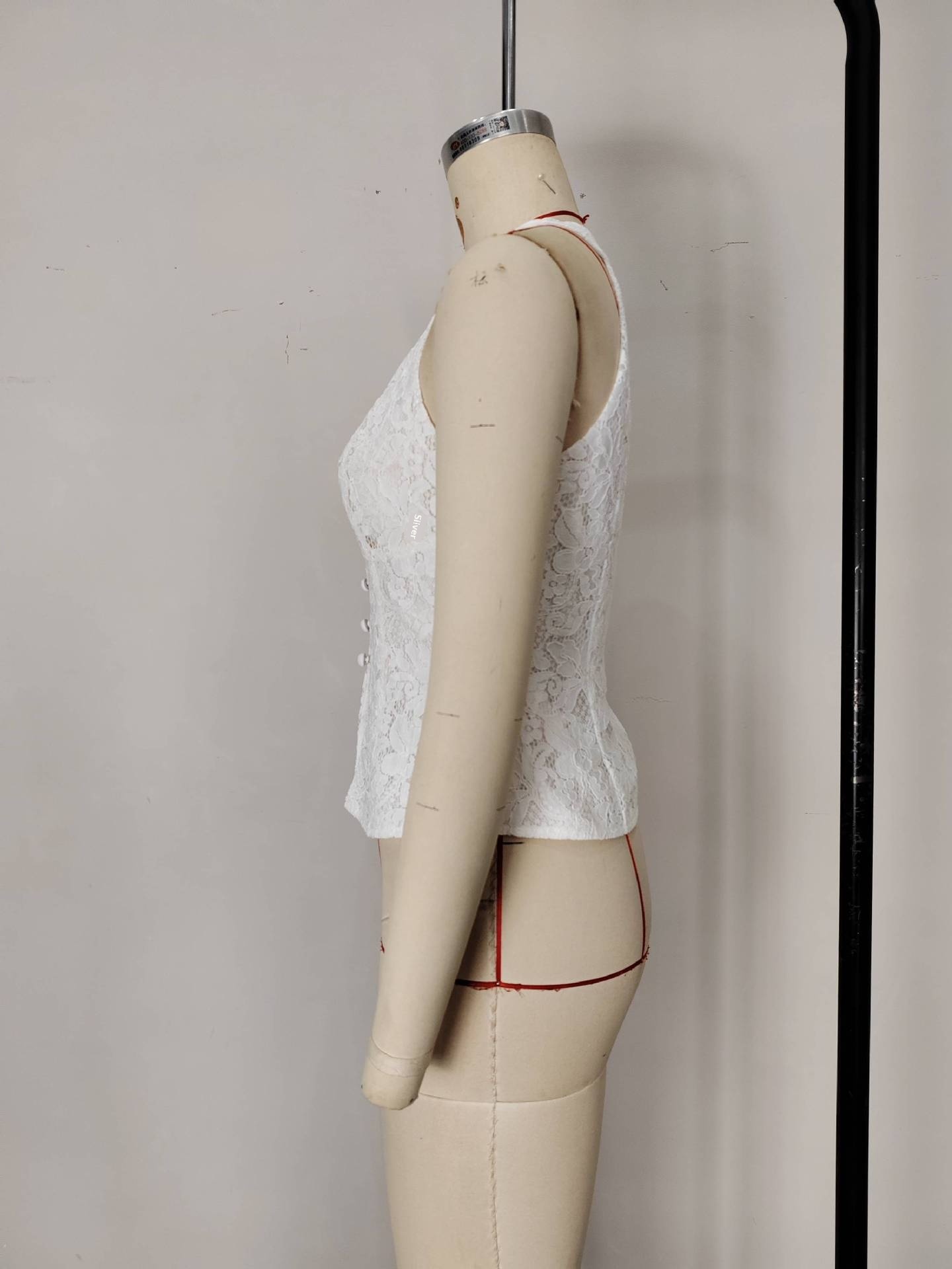 Chaleco de mujer con cuello en v y elegantes detalles de encaje_voghion.com