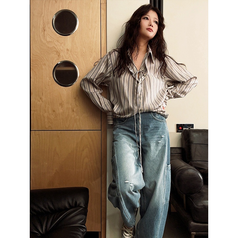 Ropa de diseñador para mujer, jeans rectos de estilo casual relajado con bolsillos laterales rasgados._voghion.com