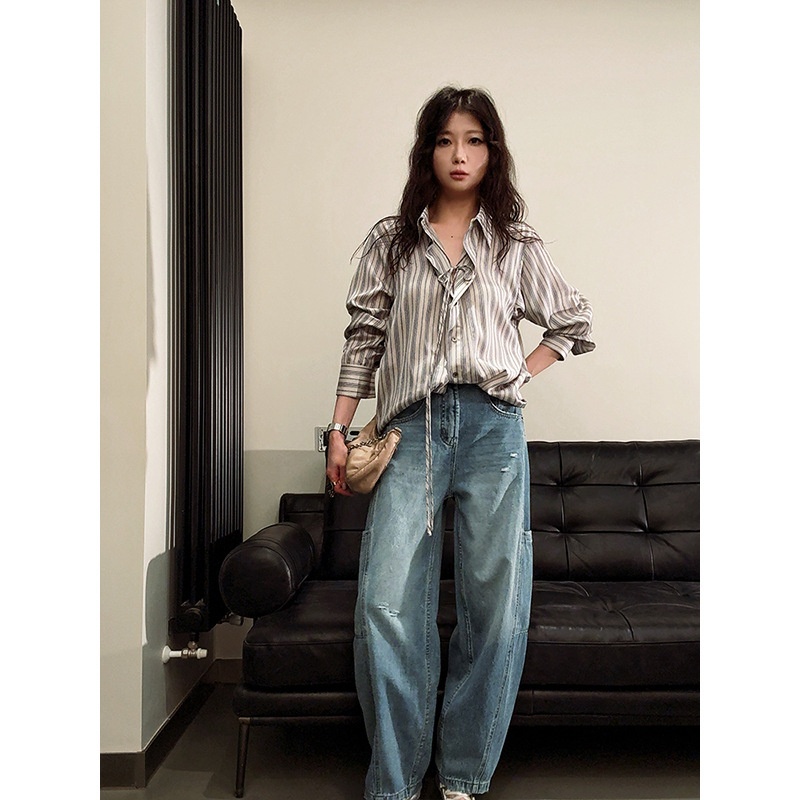 Ropa de diseñador para mujer, jeans rectos de estilo casual relajado con bolsillos laterales rasgados._voghion.com