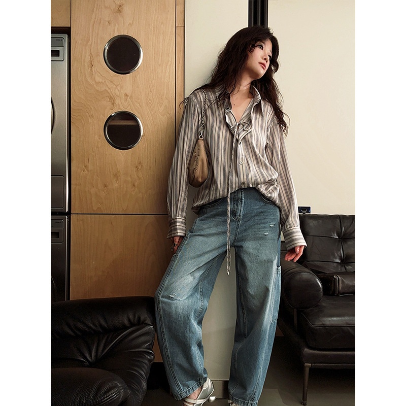 Ropa de diseñador para mujer, jeans rectos de estilo casual relajado con bolsillos laterales rasgados._voghion.com