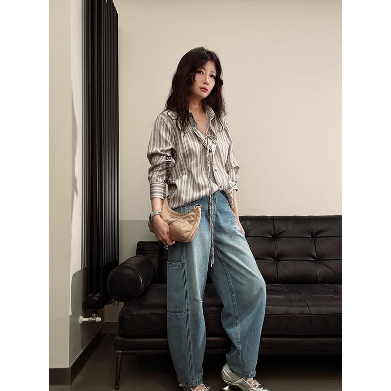 Ropa de diseñador para mujer, jeans rectos de estilo casual relajado con bolsillos laterales rasgados._voghion.com