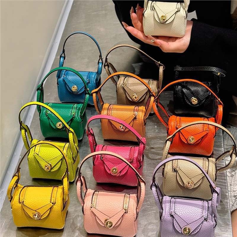 Creatief minitasje geschikt voor de beschermhoes van de Airpods Pro2 Bluetooth-oortjes, als portemonneetje of als accessoire voor autosleutels._voghion.com